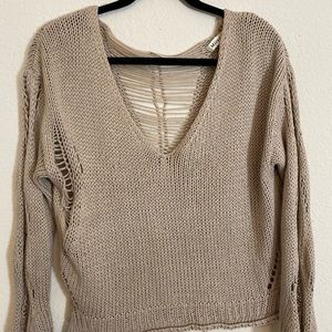 Distressed crop sweater